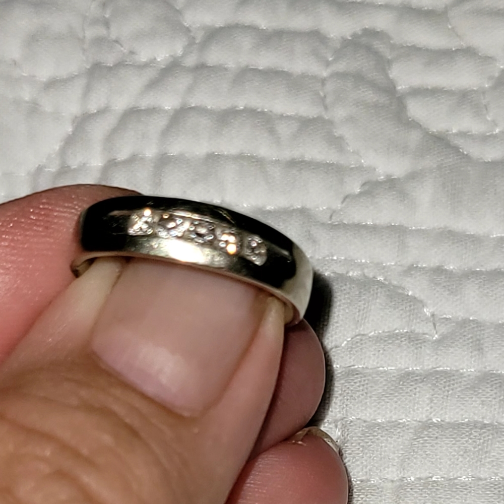 White Gold and diamond wedding band. Size 8.